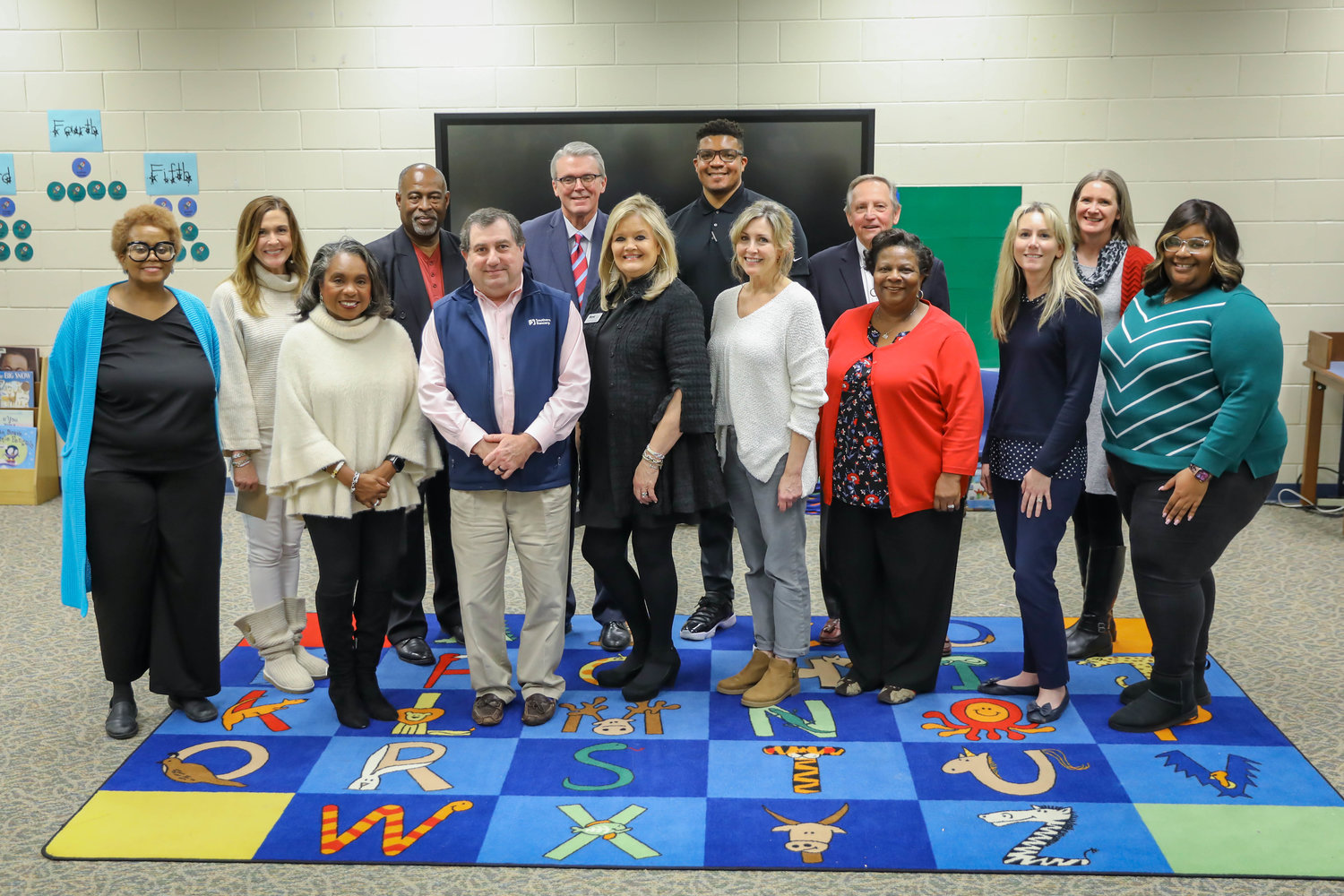 Staff from Camden Elementary and Luther Branson Elementary received $10,000 in gift cards from the Madison County Schools Education Foundation to help teachers drive back and forth to school and deal with gas costs. Pictured, from left: (Front row) Charlotte Seals, Madison County Schools superintendent; Joseph Ricotta, Madison County Community Trust; Gaye Broyles, MCSEF; Sherry Liston, Camden Elementary teacher; Dr. Fannie Green, Camden Elementary principal; Shonda Pummel, Camden Elementary teacher; Zoe Kenney, Camden Elementary teacher. (Back row) Deborah Griffin, Camden Elementary teacher; Alecia Persac, Camden Elementary teacher; Tim Pickett, MCSEF; Phil Buffington, Madison County Community Trust; Chamar McDonald, MCSEF; Cecil Harper, Madison County Community Trust; and Sissy Lynn, MCSEF.